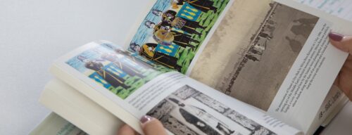 An open book with some graphics and text