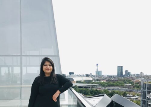 A STEP student from Cohort 12 in black dress on the AgaKhan Centre terrace garden