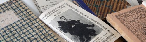 From the left, a book with green and light yellow tiles cover on Pir Hasan Kabirdin, next, the front page with Sultan Muhammad Shah's picture on a book published in Mumbai and on the right, a book page depicting Arabic/Urdu script