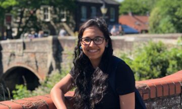 A GPISH student Semina Halani standing in sunshine and posing