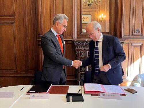 Dr. Farhad Daftary shaking hands with Mr. Philippe Advani while signing Memorandum of Understanding with INALCO Foundation at IIS