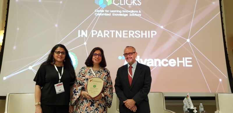 Tashmin, a Zairi Awardee in the centre with two dignitaries on two sides posing for a picture