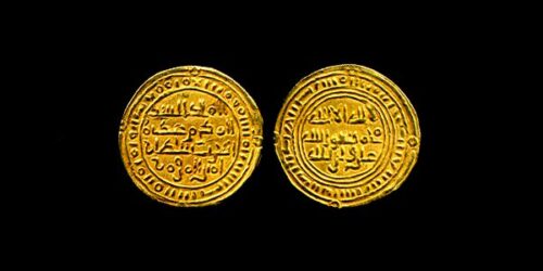 An image of two gold coins from the ancient times.