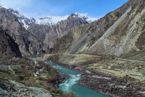 A bird eye view of Panj river with mountains on the side