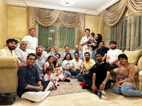 IIS GPISH students sat on sofas and on the floor in an indoor setting in Amman, Jordan