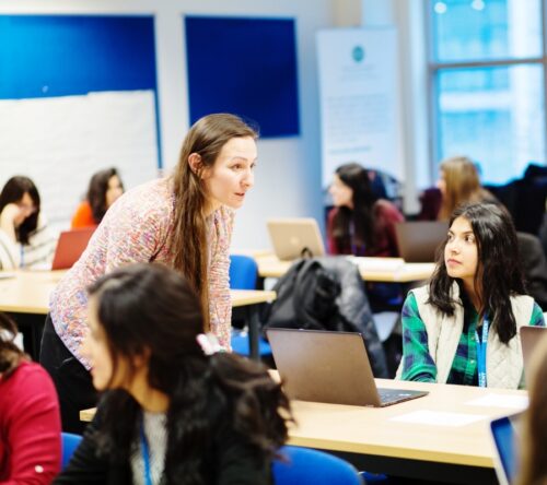 STEP classroom, teacher speaking with students