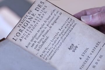 closeup of a French book about the assassin legends