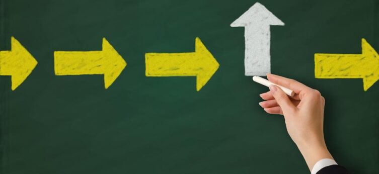 Three yellow coloured arrows on the right, one white arrow going up direction and the last yellow arrow on the right direction