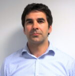 A passport size photo of Dr. Omar