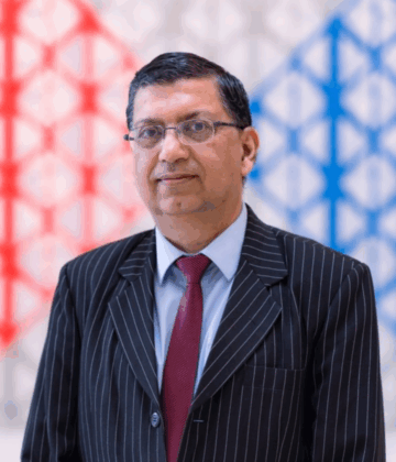 Najam Abbas in a black suit