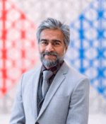 A photo of Rafiq Ajani with the AKC background