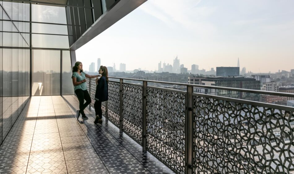 Two girls standing at the Aga Khan Centre Terrace of Discovery